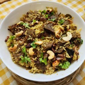 Beef Biryani is a delectable and aromatic rice dish that combines succulent pieces of beef with fragrant basmati rice and an array of spices. It is a beloved and popular dish in South Asian cuisine, particularly in countries like India and Pakistan. 