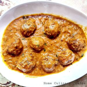 Meatball curry is prepared by frying minced meat balls in hot oil and then immersing these fried balls in a prepared curry sauce. In India, meatballs are called as Kofta. Hence this curry is also known by the name Kofta curry.