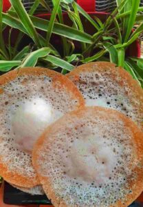 Paalappam or Hoppers is one of the popular breakfast items of Kerala. Traditionally, ground rice was fermented using toddy, but nowadays yeast is mainly used for fermentation.
